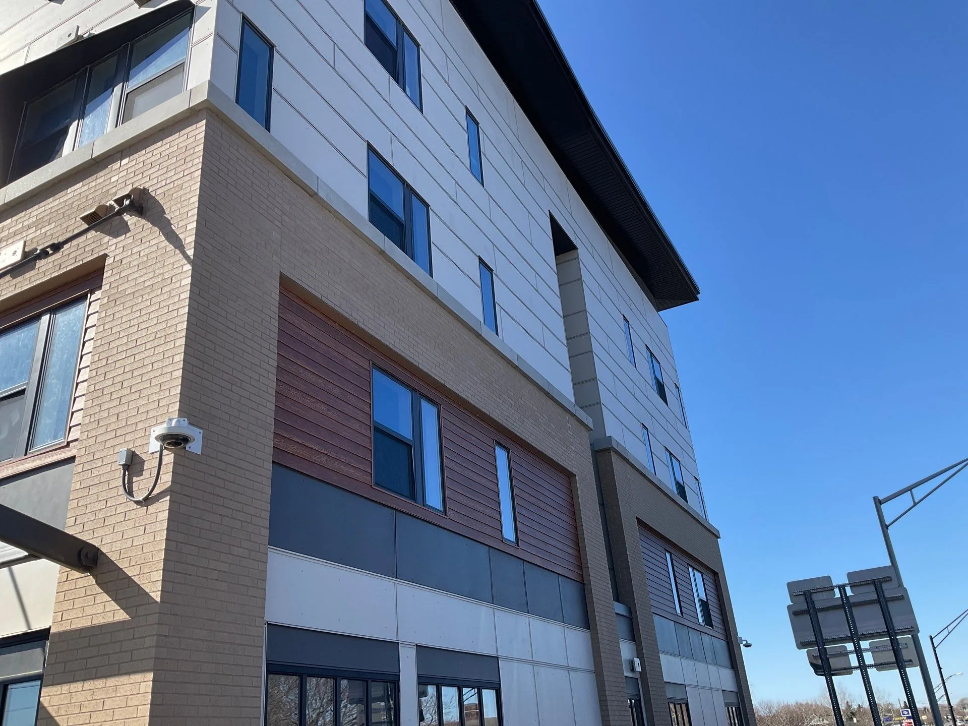 Commercial window cleaning Oswego corner exterior by Emerald City Window Cleaning
