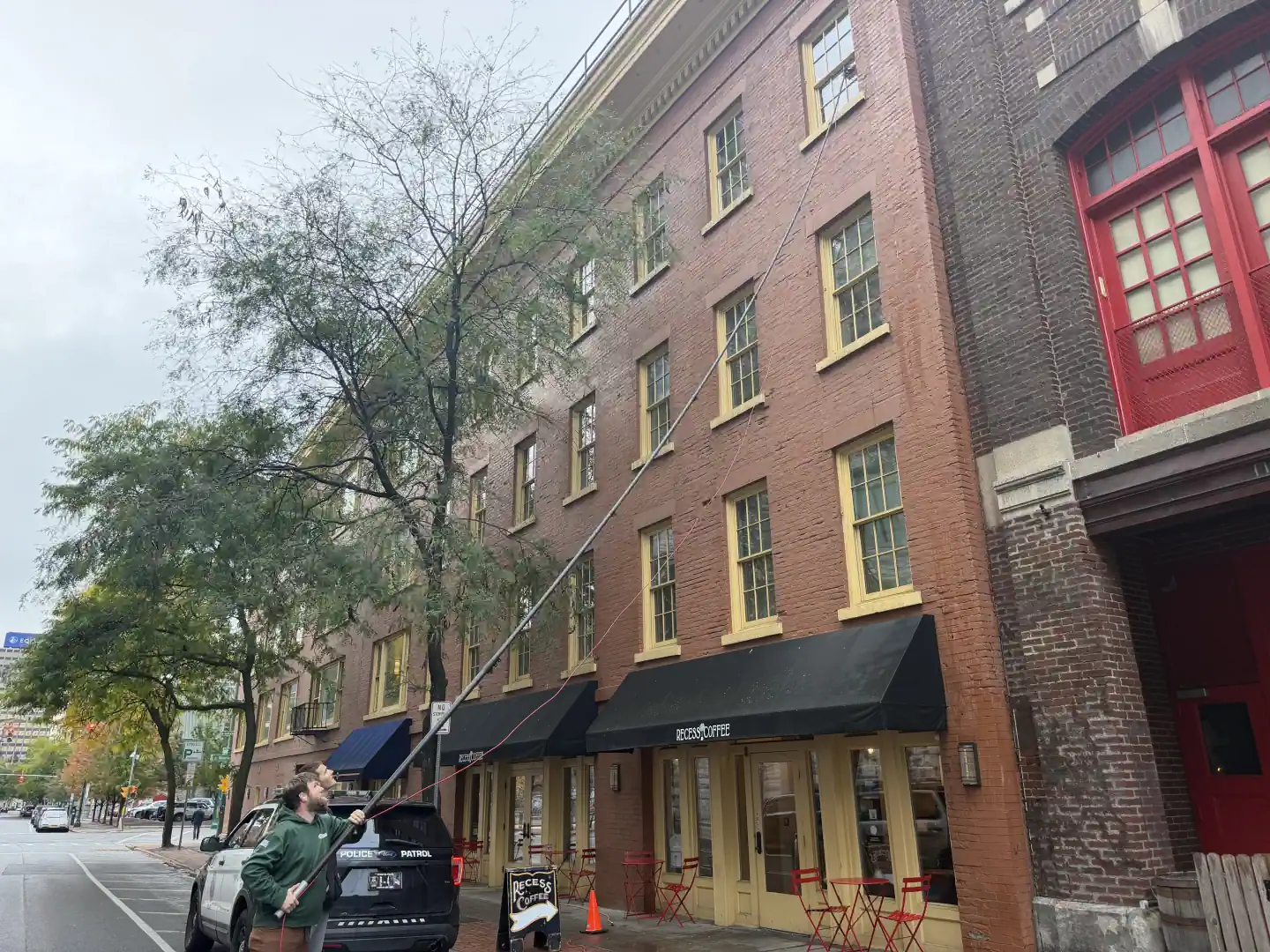 Clean multi-pane windows on the Courier Building after Syracuse commercial window cleaning