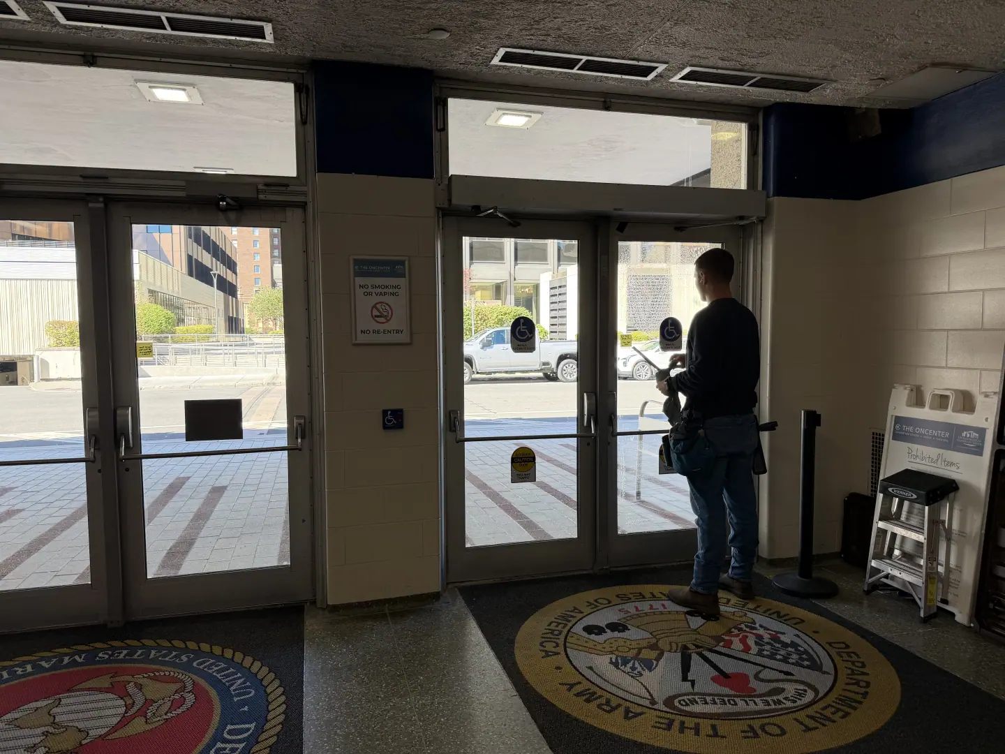 Clean windows at the downtown Syracuse War Memorial after professional window cleaning