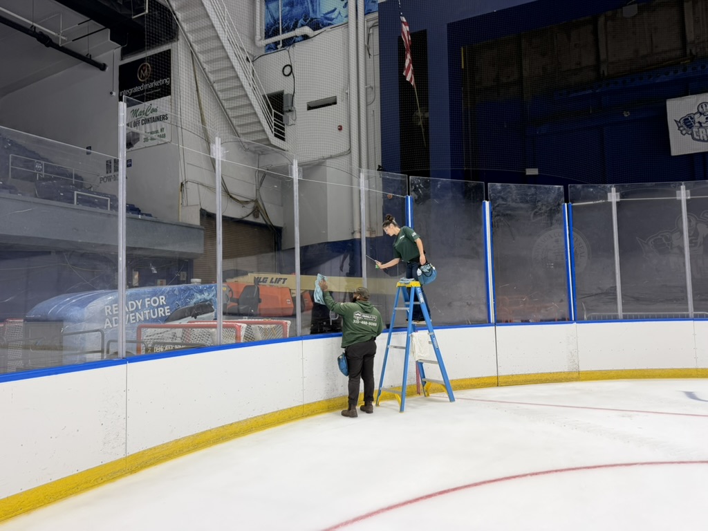 Syracuse War Memorial Arena Glass Cleaning and Puck Mark Removal